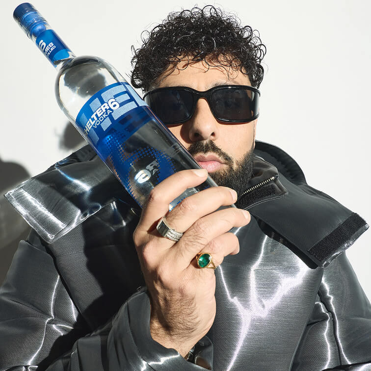 badshah Badshah with Shelter 6 vodka in hand, premium Russian distilled vodka brand in India
